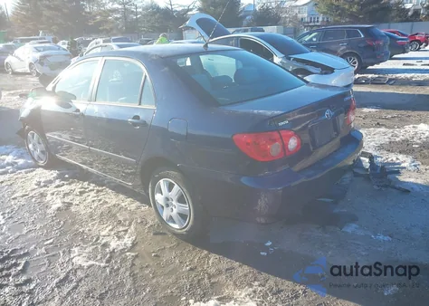 2005 Toyota Corolla Le z USA, uszkodzony, nr VIN 2T1BR32E05C427118